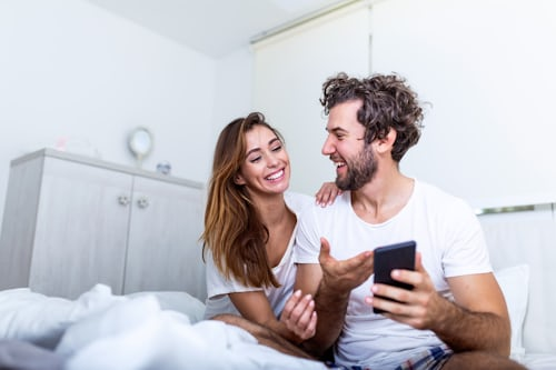 Flirtatious conversation on phone screen post-spell